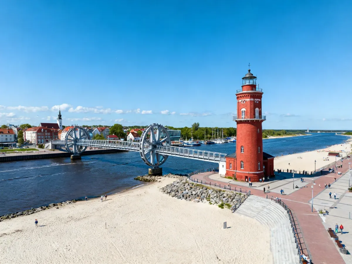 Panoramic view of Ustka harbor, lighthouse, promenade and footbridge