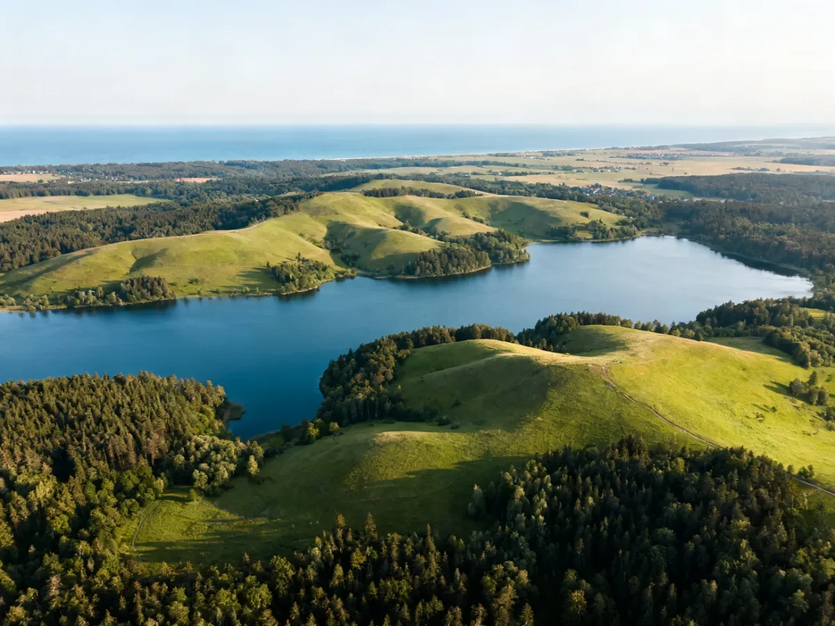 Panoramic landscape of Kashubian lakes, hills, forests and coastline