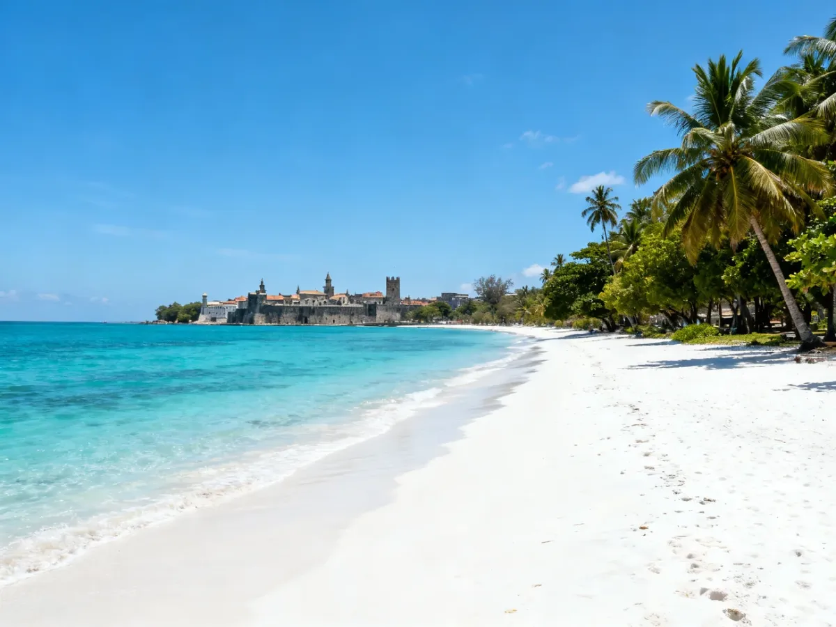 Widok Zanzibaru łączący tropikalną plażę, turkusowe morze i zabudowę Stone Town